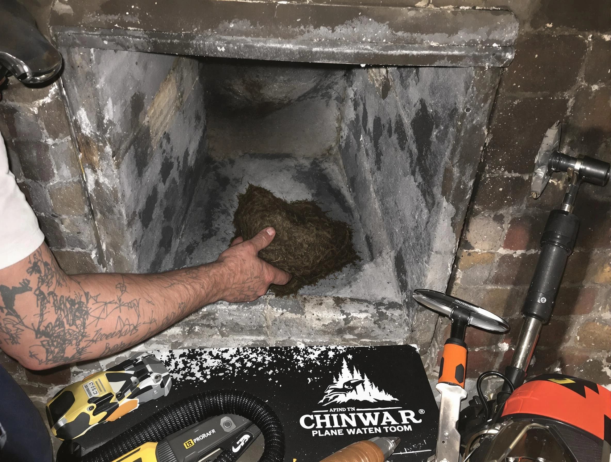 Moon Chimney Sweep safely removing debris and screening chimney in Moon, PA